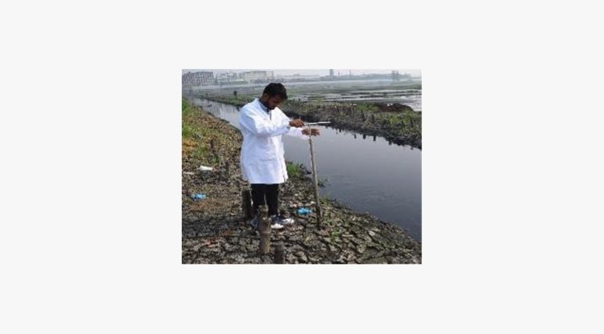 ESDO staff member is taking samples from the soil in Kathgara Bazar Area, Ashulia