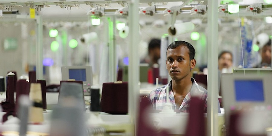 Male worker in a spinning mill